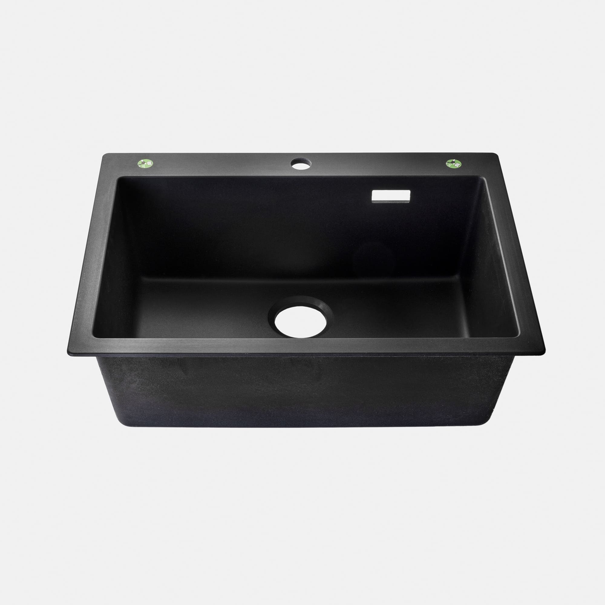 クォーツシンク シングル ブラック KB-KC031-01-G173 中央に水栓穴φ35mmが空いています。左右の緑色シール2箇所に追加の水栓や、浄水器やソープディスペンサー用に穴を追加できます